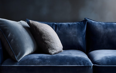 Blue sofa with pillows, close-up. Interior design conceptの素材