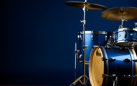 Drum set on blue background with copy space. Music concept.の素材