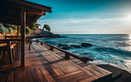 Wooden deck and terrace on the seashore at sunsetの素材