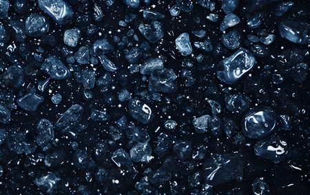 abstract background of mineral stone pebbles dark blue tintedの素材