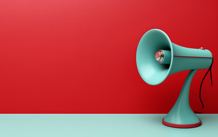 Megaphone on a red wall background. 3D illustration.の素材