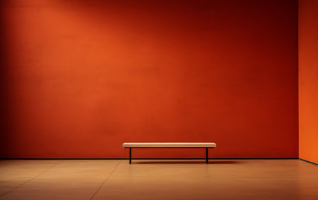 Empty bench in front of a red wall. 3D Renderingの素材