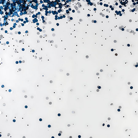Blue confetti on a white background. Festive abstract background.の素材