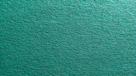 Texture of green painted concrete wall. Abstract background and texture for design.の素材