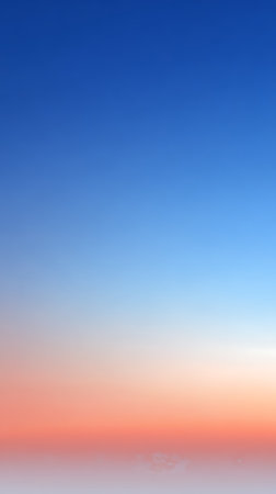 Sunset sky background. Panoramic view of the sunset sky.の素材