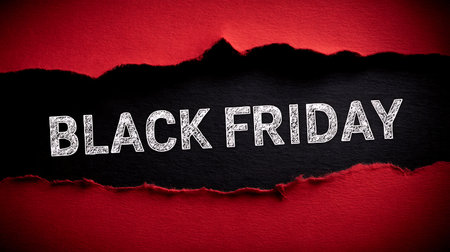 Black Friday text on red torn paper. Black Friday sale concept.の素材