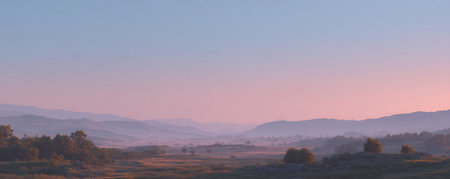 panoramic view of the mountains in the fog at sunrise in autumnの素材
