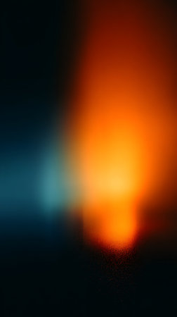 abstract orange and blue background with bokeh effect and copy spaceの素材