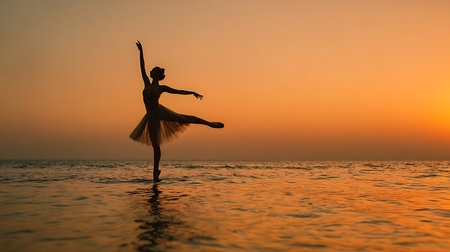Ballet dancer on the beach at sunset. Ballerina in a white tutu dancing in the water.の素材