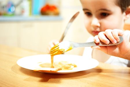 Scrambled egg and little boyの写真素材