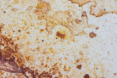 Texture of dirty stains and grease on white stove. Dried stains of fat on a white backgroundの写真素材