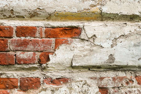 Texture of an old red brick wallの写真素材