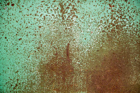 The grain texture of the old rusty metal. Background of grained rusty iron closeup.の写真素材