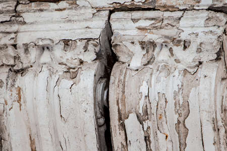 Wall with old peeling stucco close upの写真素材