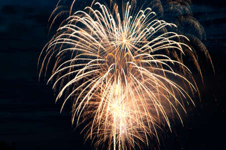Beautiful multi-colored festive fireworks in the night skyの写真素材