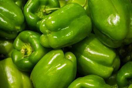 Green bell pepper at a farmers market. Vegetables for a healthy diet.