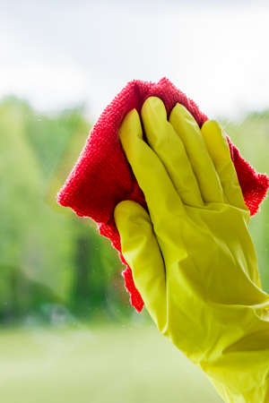 Washing dirty windows and home cleaning. Housework concept.の写真素材