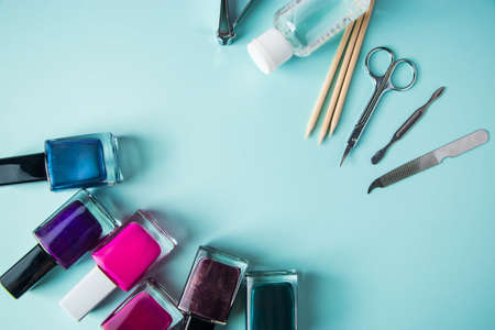 Set of tools for manicure and nail care on a blue background. Spa hand procedure, place for text.の写真素材