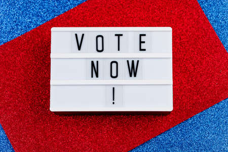 USA Election Day - November 3, 2020. Voting concept. Sign on a red and blue background.の写真素材