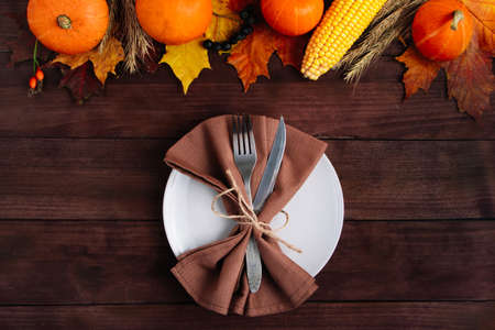 Beautiful festive table setting for Thanksgiving. Autumn and harvest concept.