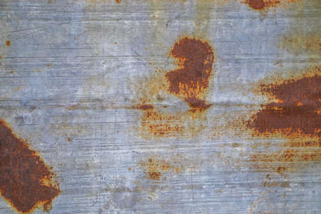 Background from rusty metal close-up. Rust spots on the iron.