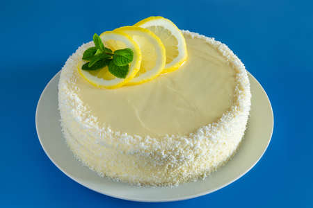 Delicious biscuit dessert with lemon and coconut. Homemade birthday cake.