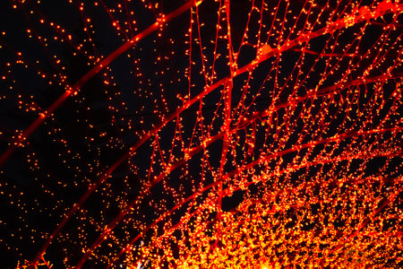 New Year illumination of the city. Tunnel of the glowing Christmas garland. Selective focusの写真素材