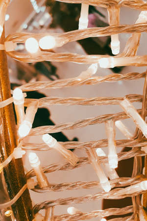 Christmas garland close up. Lots of bulbs. Holiday illumination.