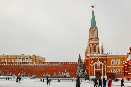 Tourists on Red Square in Moscow in winter. Travel to Russia in December and January. Landmark Kremlin. January 10, 2015 - Moscow, Russia.のeditorial素材