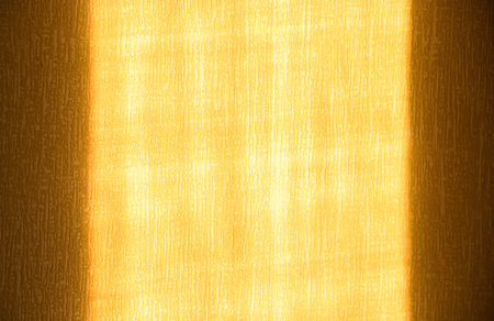 Sunbeam on yellow wall of house. Surface texture with sun glare. Abstract background.の写真素材