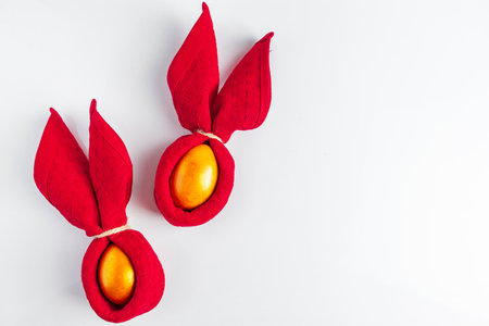 Easter bunny and egg. Festive decor on white background. Place for text.の写真素材
