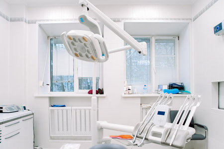Modern dental equipment in dentist clinic. Dentists tools for treatment and surgery of teeth. Special medical instruments.の写真素材