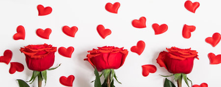 Red roses and hearts on white background. Valentine's day greeting card. Place for your text.の写真素材