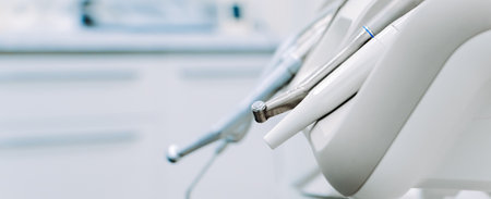 Modern dental equipment in dentist clinic. Dentists tools for treatment and surgery of teeth. Special medical instruments.の写真素材
