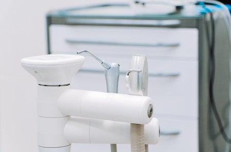 Modern dental equipment in dentist clinic. Dentists tools for treatment and surgery of teeth. Special medical instruments.の写真素材
