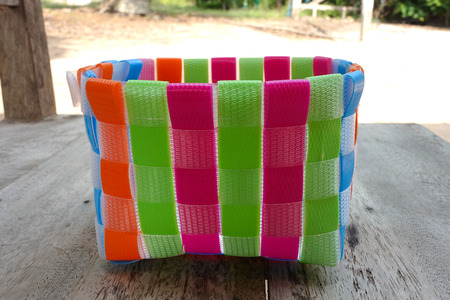Very beautiful handmade colored plastic basketsの写真素材