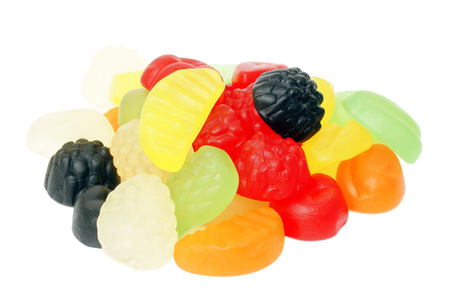 Jelly candies of different colors on a white background の写真素材