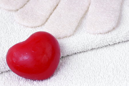 Heart Soap on a towel with washcloth の写真素材
