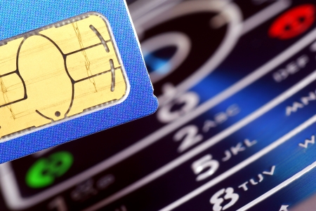 Phone card, sim  with mobile phone の写真素材