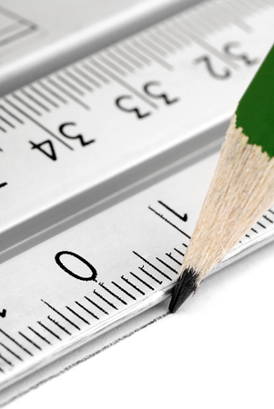 The pencil draws a line with a rulerの写真素材