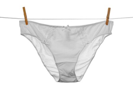 Panties hanging on a clothesline on a white background.