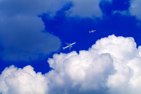 Two aircraft in the cloudsの写真素材