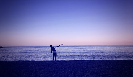 sillohuette boy playingの写真素材