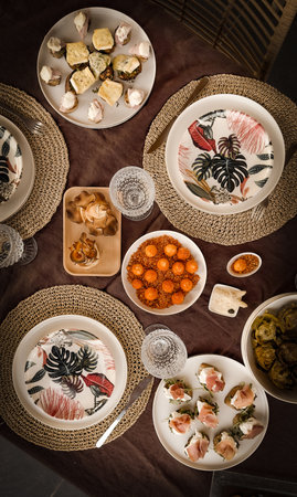 Traditional Turkish and Greek dinner appetizer table with a variety of dishesの写真素材