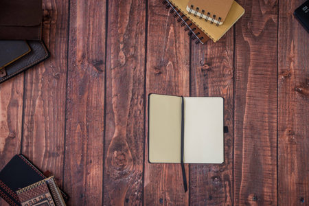 Office supplies on wooden table. Top viewの写真素材