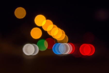abstract blur of night lights formed a triangleの写真素材