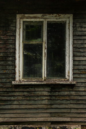 window of the old wooden houseの写真素材