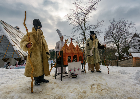 Uzhgorod, Ukraine - January 15, 2017: Carols in old village festival in TransCarpathian Regional Museum of Folk Architecture and Lifeのeditorial素材