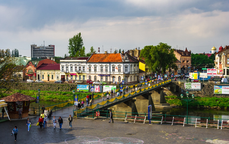 Uzhgorod, Ukraine - April 29, 2011: bird eye view of Uzhgorod town. Pedestrian bridge and old architecture on Shandor Petefi square. のeditorial素材