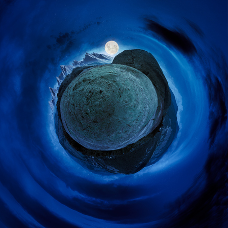 little mountain planet night spherical panorama. lovely countryside concept with 360 degree view. agricultural field on hillside and village in the valley. beautiful sky with fluffy cloudsの写真素材
